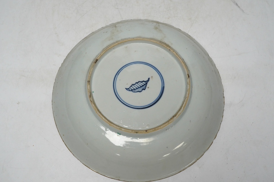 A Chinese famille verte dish, Kangxi period, 21cm. Condition - rim chips, otherwise fair